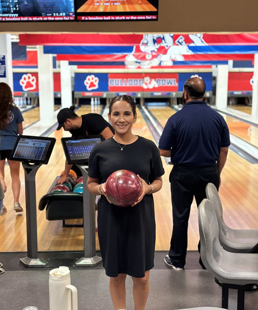 Summer Picnic 1 Girl standing at bowling lane with bowling ball