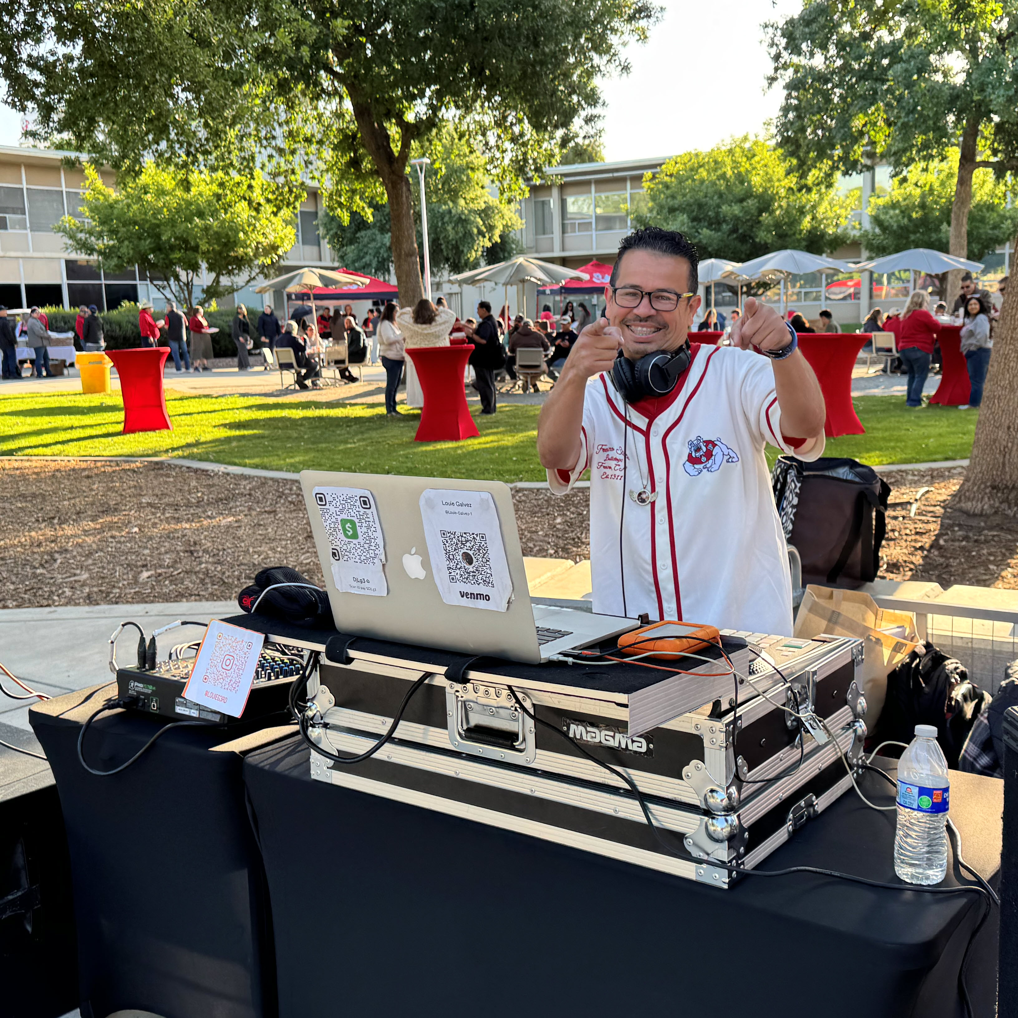 DJ Louie giving two thumbs up